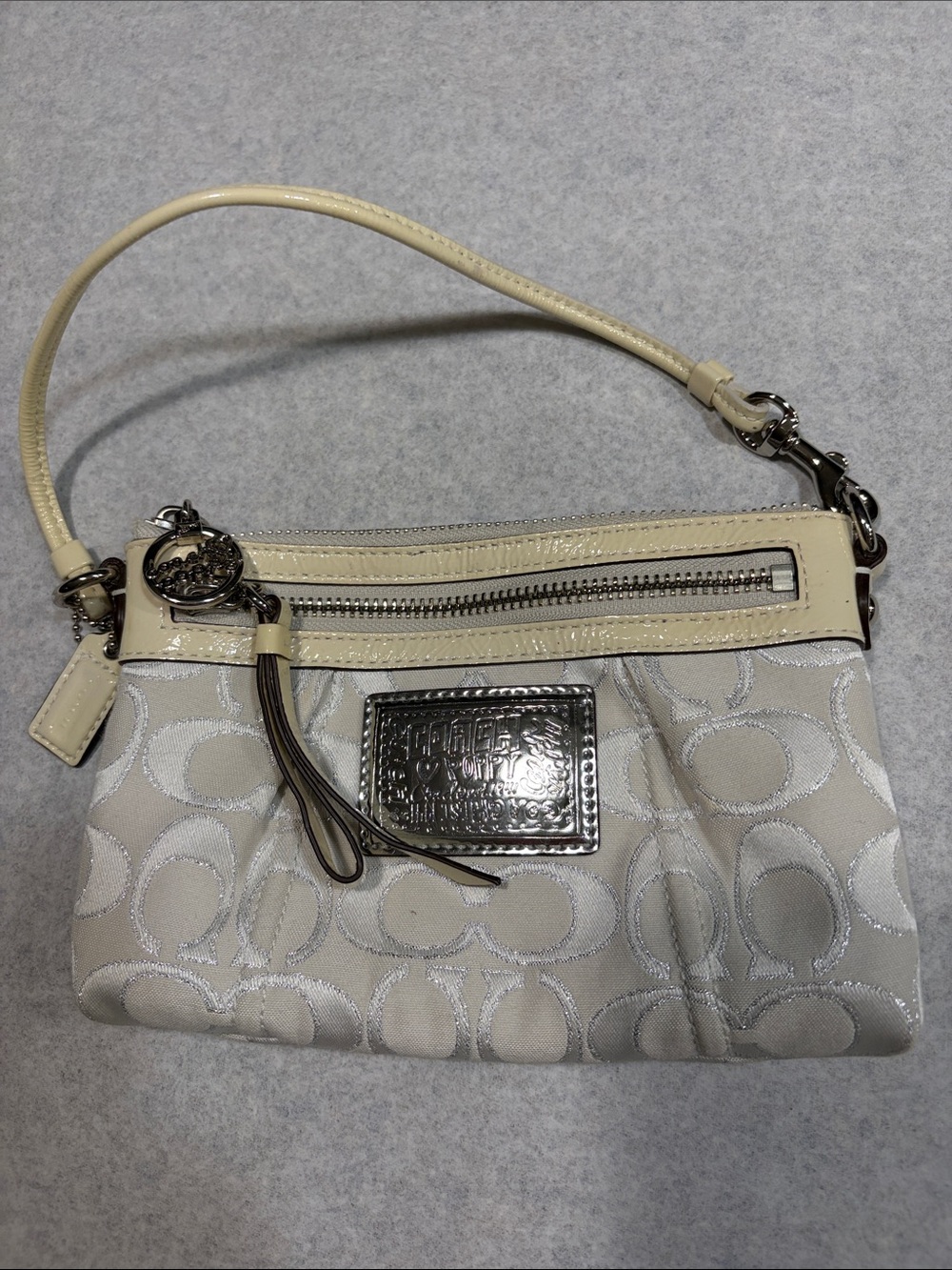 Coach Poppy Light Beige Signature Jacquard Wristlet with Silver Hardware